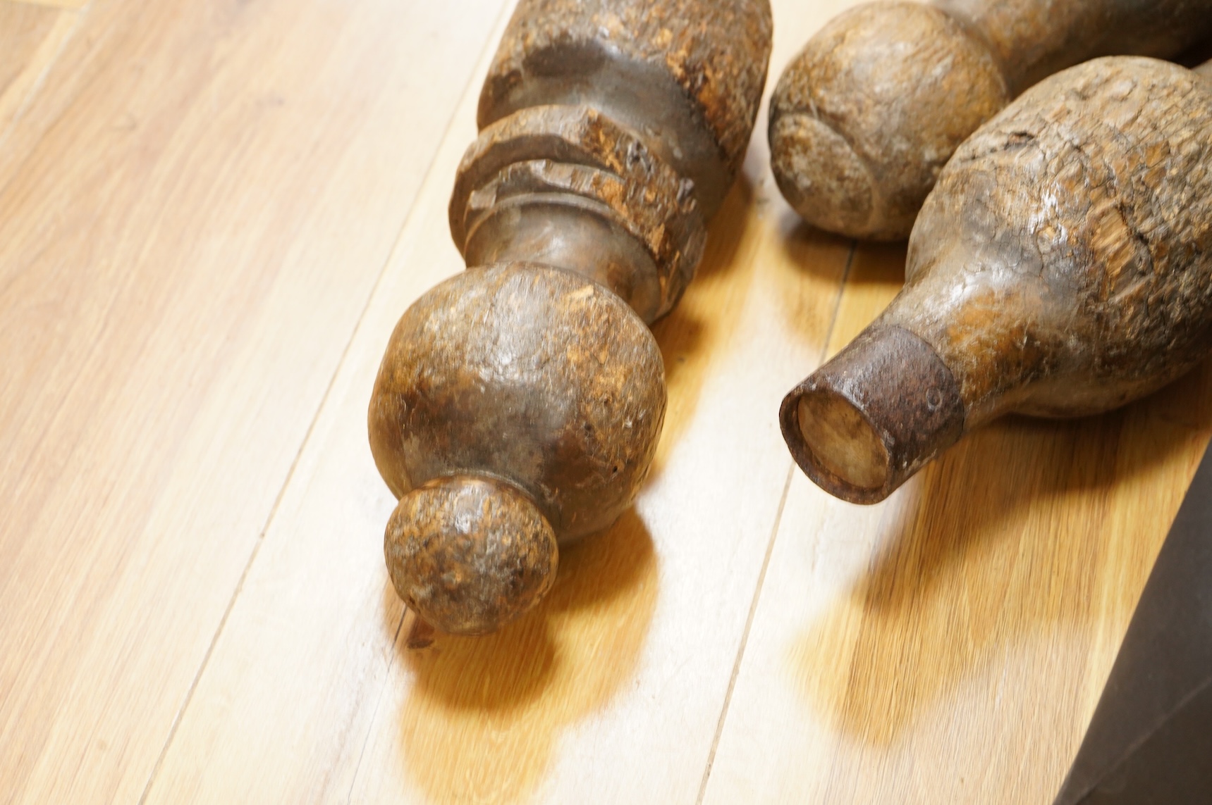 A set of turned wood skittles
